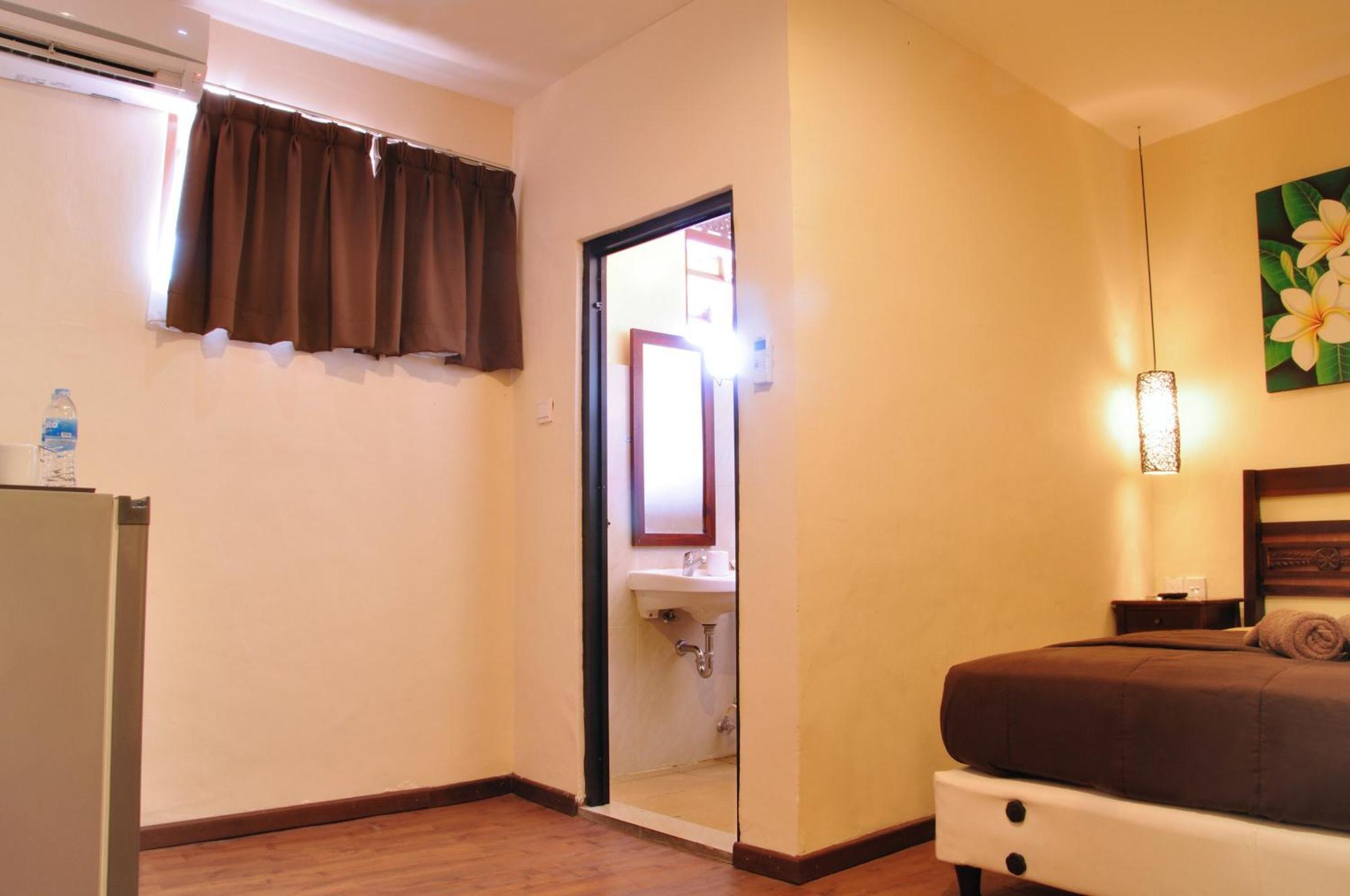 Bemo Corner Guest House Kuta Lombok Szoba fotó